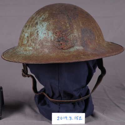 1917 - 1918 2nd pattern painted Brodie helmet with 4th Canadian Mounted Rifles Regiment OVERSEAS moose head badge brazed to front