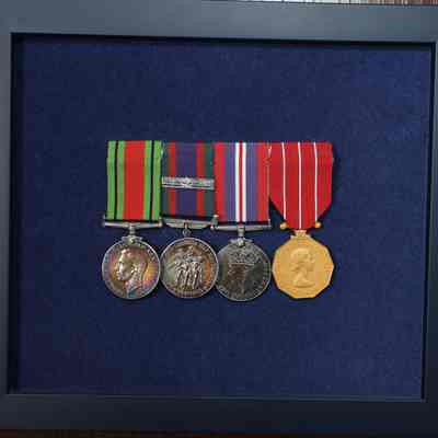 1950's Canadian Forces Decoration, to Lieutenant-Commander (MN) G.J. Walker.