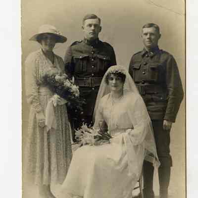 Postcard "A RPPC of Corporal "Stanley White" and his wife on their wedding day."