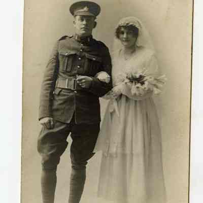Postcard "A RPPC of Stanley White of the 4th Battalion and his wife Lewis on their wedding day. February 6th, 1918."