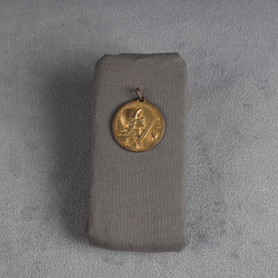 Medallion associated with the paper shown above.