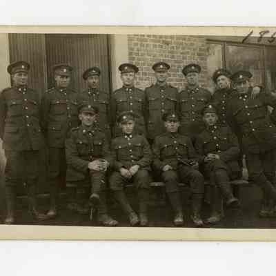 Postcard "Unidentified RPPC of twelve 4th Battalion Men in France. 1917."