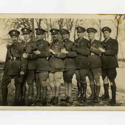 Postcard "An unidentified RPPC of eight 4th Battalion officers in France."