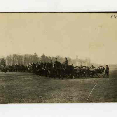 Postcard "An unidentified RPPC of 4th Battalion soldiers on horseback pulling supply carts."