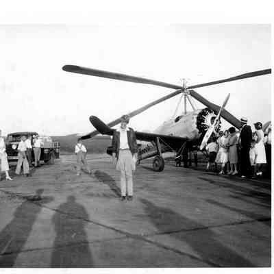Amelia Earhart with onlookers in front of the Beechnut Gum Autogyro