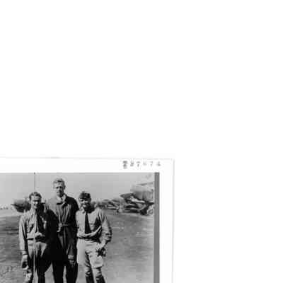 Charles Lindberg posing with Two Unknown Servicemen, Tulsa Airport