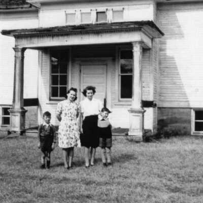 Photograph- Family Posing in Front of Sellwood School
