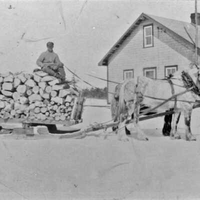 Photograph, Logs On a Horse Drawn Sleigh in Winter