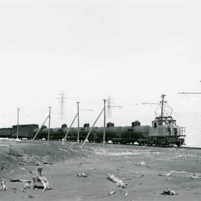 Photograph, INCO Engine 119 and Train, Hi Line, from collection of Dave Shaw.