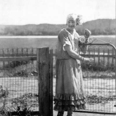 Photograph- A Woman at a Gate