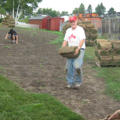 Photograph, NORMHC, Stu Thomas, Sod Laying.