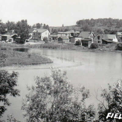 Photograph - Overview of river and houses, Field, Ontario