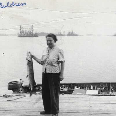 Harold Prescott and Mules Holden On a Dock in Georgian Bay, 1958