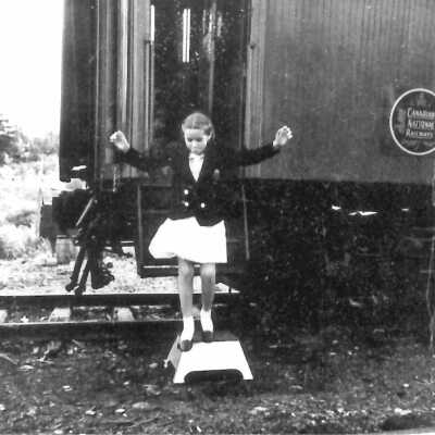 Photograph - Student stepping off the school car