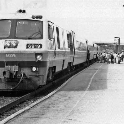 Photograph - Passengers boarding VIA Rail train in Kingston, ON