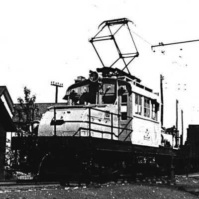 Photograph, INCO Loco #101 & Line car.