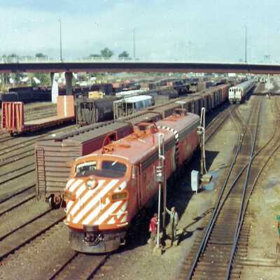 Photograph - CP Rail locomotive in a railroad yard