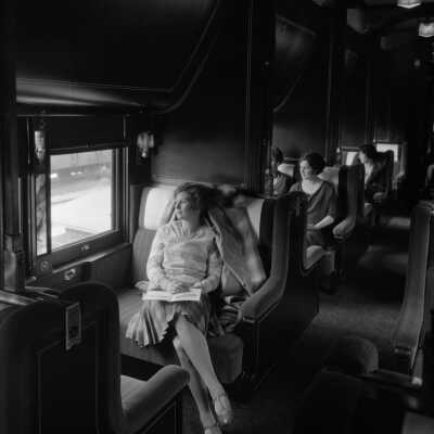 Photograph, Canadian National Railways (CNR) Sleeping car - interior with figures.