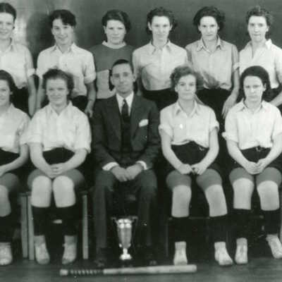 Photograph, Girls baseball team, Capreol, Ontario. Girls Softball Team, M. Wychara, M. Garrity, R. Garrity, M. Deavy, E. Studer, Marion Deavy, F. Lajambe, D. Studer, Mr. Wallace, E. Nepitt, M. McLean.