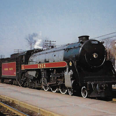 Canadian Pacific Postcard showing Royal Hudson Steam Engine #2828 at Montreal West in 1958