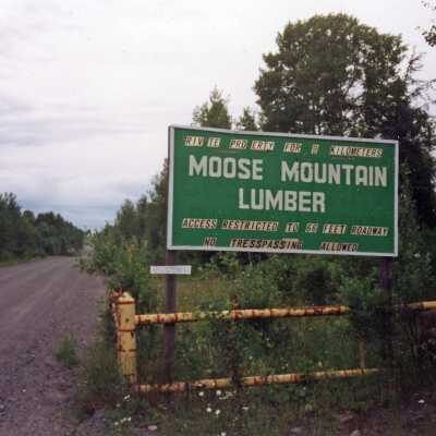 Photograph, Moose Mountain Lumber Sign.