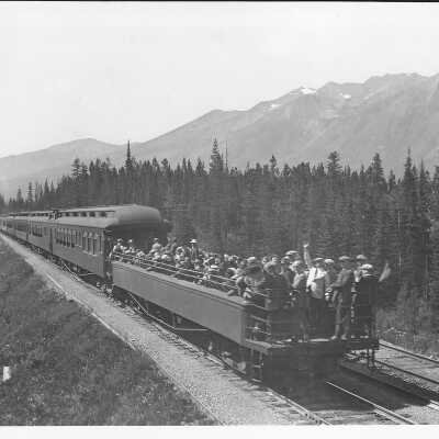 Passengers Waving on the Observation Car of the Canadian Pacific Trans-Canada Train
