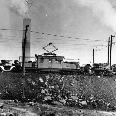 Photograph, INCO Locomotive 104 with slag pots, Copper Cliff.