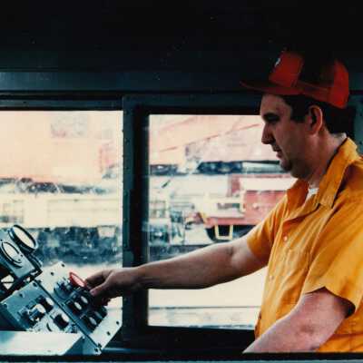 Photograph- Man at Engine Controls
