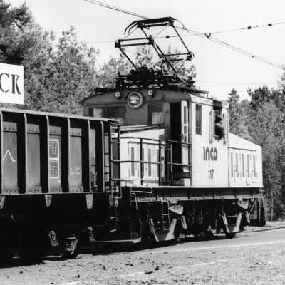 Photograph, INCO Locomotive 117 with MT Ore at Levack, August 1981.