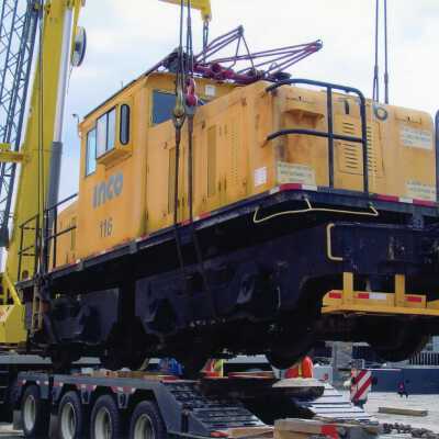 INCO Locomotive #116 Being Placed on a Flatbed to be Brought to Prescott Park