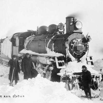 Photograph, Canadian Northern Railway locomotive No. 2036 at Mair station Saskatchewan.