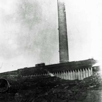 Photograph - Smoke stack and slag pot