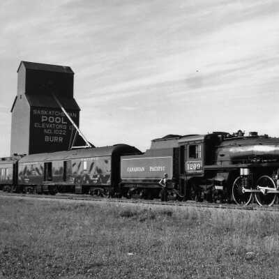 Canadian Pacific Steam Locomotive #1209 Pulling Passenger Cars