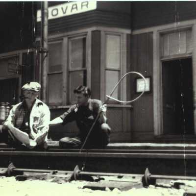 Photograph, CNR Employees Steve Elliott, Frank Holinger, Student Telegrapher, 1953.