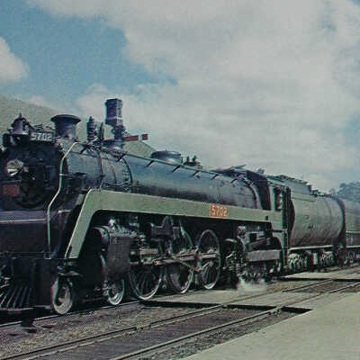 Canadian National Postcard showing Hudson Type Steam Engine #5702 at the Guelph Station, 1957