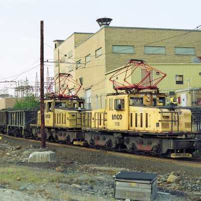 INCO Electric Locomotives #119 and #112 Pulling Ore Cars