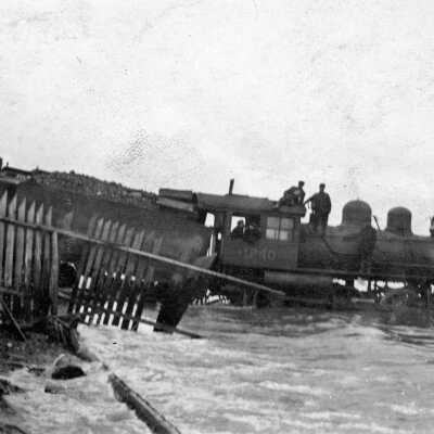 Photograph, Engine 1240, Derailment in the Water, at Port Arthur, Canadian Northern Railway.
