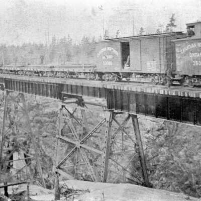 Photograph, First Freight Train Over the Still River Bridge, on the Canadian Northern Railway.