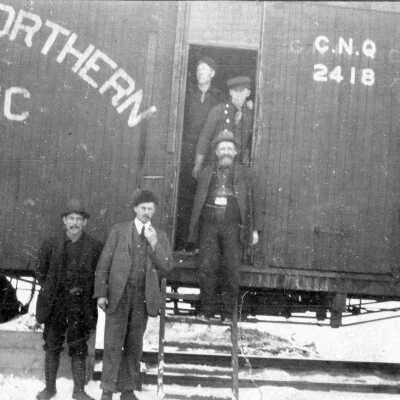 Photograph, Five men in front of the Canadian Northern Quebec Railway car, No 2418.