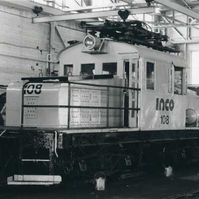 Photograph, INCO Electric 108 in Loco Shop, Copper Cliff, Ontario, May 17, 1975, Photo by Gordon Jomini.