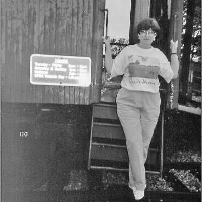 Photograph - Elizabeth Hill standing on the school car, Clinton 1994