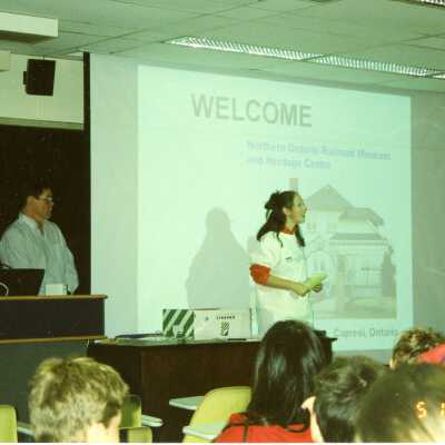 Laurentian student introducing NORMHC at the Laurentian University Heritage Fair, 10 May 2002