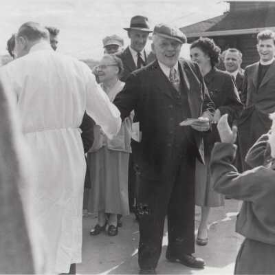 Photograph- Addie Sweezey Shaking Hands