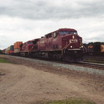 Photograph - CP Rail train pulling into railroad yard (?)