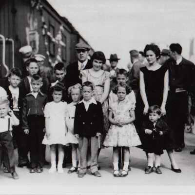 Photograph- Adam Sweezey With Group of Children