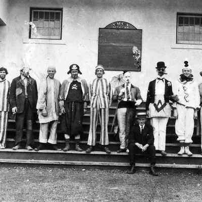 Photograph - Members of a theatre group (?) posed on the steps of the Capreol Y.M.C.A.