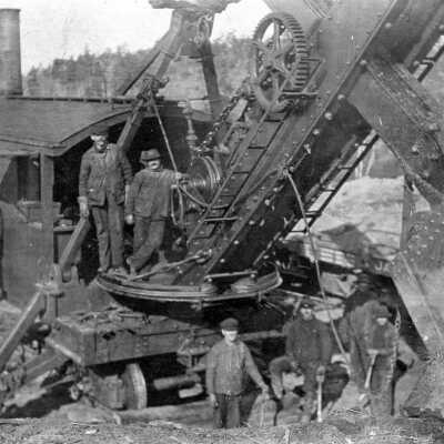 Photograph, Postcard of the Angus Sinclair gang, Supervising the Operation of a Steam Shovel on the Canadian Northern Railway.