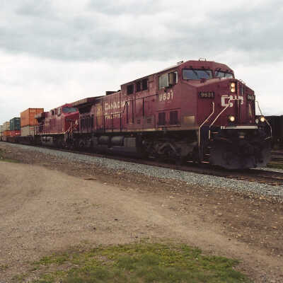 Photograph - CP Rail train pulling into railroad yard (?)