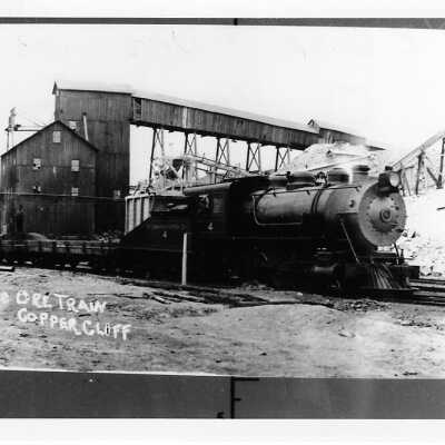 Photograph: Canadian Copper Company Locomotive #1 Pulling Ore Cars