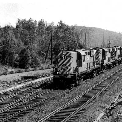 Photograph, CPR Locomotive 8780 & ore empties.
